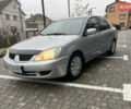 Сірий Міцубісі Lancer, об'ємом двигуна 1.58 л та пробігом 333 тис. км за 2450 $, фото 1 на Automoto.ua