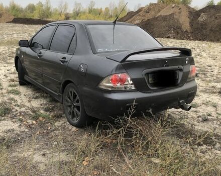 Міцубісі Lancer 2006 у Синельниковом на Automoto.ua Сірий Міцубісі Lancer, об'ємом двигуна 2 л та пробігом 200 тис. км за 3000 $, фото 1 на Automoto.ua