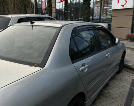 Серый Мицубиси Лансер, объемом двигателя 1.6 л и пробегом 310 тыс. км за 3500 $, фото 8 на Automoto.ua