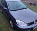 Сірий Міцубісі Lancer, об'ємом двигуна 1.6 л та пробігом 190 тис. км за 3500 $, фото 7 на Automoto.ua