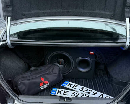 Серый Мицубиси Лансер, объемом двигателя 2 л и пробегом 256 тыс. км за 7000 $, фото 6 на Automoto.ua