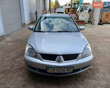 Серый Мицубиси Лансер, объемом двигателя 1.58 л и пробегом 215 тыс. км за 4000 $, фото 2 на Automoto.ua