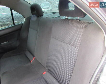 Серый Мицубиси Лансер, объемом двигателя 1.58 л и пробегом 300 тыс. км за 3600 $, фото 9 на Automoto.ua