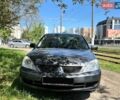 Серый Мицубиси Лансер, объемом двигателя 1.6 л и пробегом 375 тыс. км за 3900 $, фото 1 на Automoto.ua