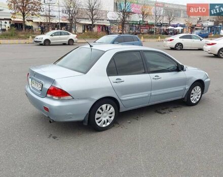 Мицубиси Лансер 2006 в Киеве на Automoto.ua Серый Мицубиси Лансер, объемом двигателя 1.6 л и пробегом 426 тыс. км за 3800 $, фото 7 на Automoto.ua