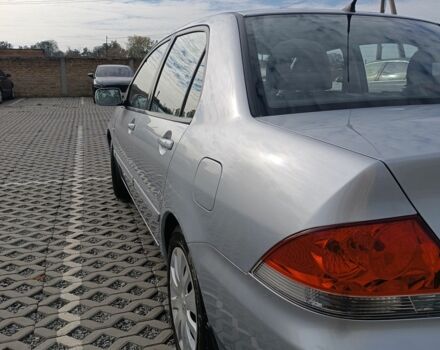 Сірий Міцубісі Lancer, об'ємом двигуна 1.6 л та пробігом 267 тис. км за 3600 $, фото 4 на Automoto.ua