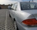 Сірий Міцубісі Lancer, об'ємом двигуна 1.6 л та пробігом 267 тис. км за 3600 $, фото 4 на Automoto.ua