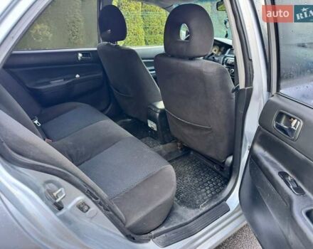 Сірий Міцубісі Lancer, об'ємом двигуна 1.58 л та пробігом 333 тис. км за 2999 $, фото 10 на Automoto.ua