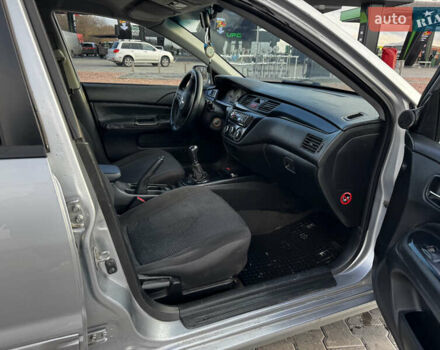 Сірий Міцубісі Lancer, об'ємом двигуна 1.58 л та пробігом 333 тис. км за 2700 $, фото 11 на Automoto.ua
