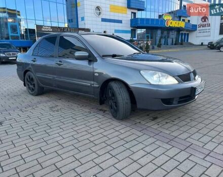 Серый Мицубиси Лансер, объемом двигателя 1.6 л и пробегом 279 тыс. км за 3990 $, фото 1 на Automoto.ua