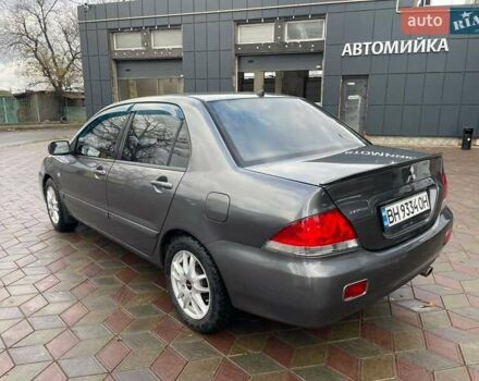 Сірий Міцубісі Lancer, об'ємом двигуна 1.6 л та пробігом 262 тис. км за 4400 $, фото 5 на Automoto.ua