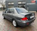 Сірий Міцубісі Lancer, об'ємом двигуна 1.6 л та пробігом 262 тис. км за 4400 $, фото 5 на Automoto.ua