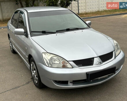 Серый Мицубиси Лансер, объемом двигателя 1.58 л и пробегом 183 тыс. км за 4800 $, фото 18 на Automoto.ua