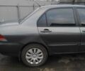 Сірий Міцубісі Lancer, об'ємом двигуна 1.6 л та пробігом 202 тис. км за 3300 $, фото 2 на Automoto.ua