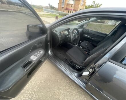 Серый Мицубиси Лансер, объемом двигателя 1.6 л и пробегом 162 тыс. км за 4650 $, фото 4 на Automoto.ua