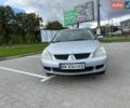 Серый Мицубиси Лансер, объемом двигателя 1.6 л и пробегом 200 тыс. км за 3500 $, фото 1 на Automoto.ua