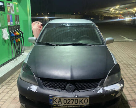 Сірий Міцубісі Lancer, об'ємом двигуна 2 л та пробігом 255 тис. км за 3500 $, фото 2 на Automoto.ua