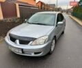 Сірий Міцубісі Lancer, об'ємом двигуна 1.58 л та пробігом 333 тис. км за 2750 $, фото 2 на Automoto.ua