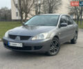 Сірий Міцубісі Lancer, об'ємом двигуна 1.58 л та пробігом 332 тис. км за 4650 $, фото 1 на Automoto.ua