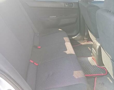 Сірий Міцубісі Lancer, об'ємом двигуна 1.58 л та пробігом 265 тис. км за 2900 $, фото 7 на Automoto.ua
