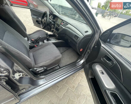 Сірий Міцубісі Lancer, об'ємом двигуна 1.58 л та пробігом 162 тис. км за 4650 $, фото 12 на Automoto.ua