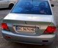 Сірий Міцубісі Lancer, об'ємом двигуна 1.6 л та пробігом 243 тис. км за 4700 $, фото 8 на Automoto.ua