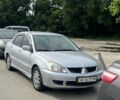 Сірий Міцубісі Lancer, об'ємом двигуна 1.58 л та пробігом 197 тис. км за 3450 $, фото 1 на Automoto.ua