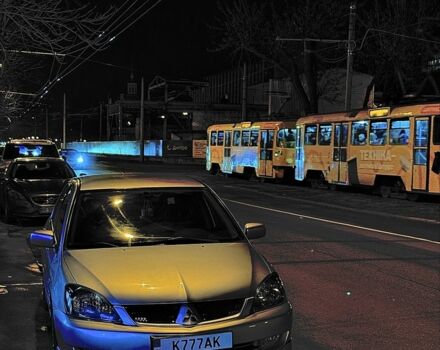 Серый Мицубиси Лансер, объемом двигателя 2 л и пробегом 256 тыс. км за 7000 $, фото 12 на Automoto.ua