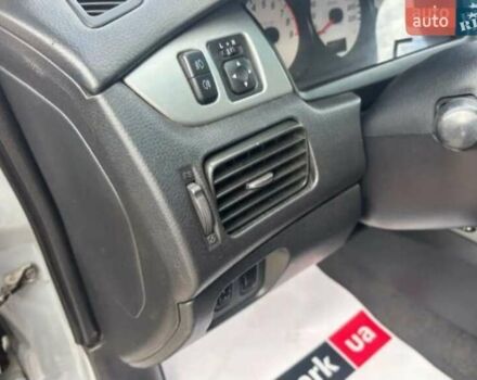 Сірий Міцубісі Lancer, об'ємом двигуна 2 л та пробігом 263 тис. км за 4300 $, фото 11 на Automoto.ua