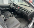 Сірий Міцубісі Lancer, об'ємом двигуна 1.58 л та пробігом 333 тис. км за 2950 $, фото 14 на Automoto.ua
