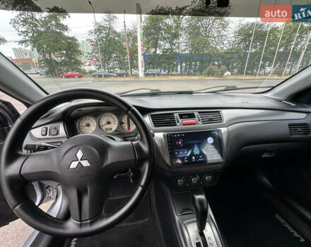 Серый Мицубиси Лансер, объемом двигателя 1.58 л и пробегом 183 тыс. км за 4800 $, фото 19 на Automoto.ua