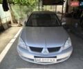 Сірий Міцубісі Lancer, об'ємом двигуна 1.58 л та пробігом 186 тис. км за 4300 $, фото 9 на Automoto.ua