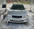 Серый Мицубиси Лансер, объемом двигателя 1.6 л и пробегом 221 тыс. км за 2287 $, фото 1 на Automoto.ua