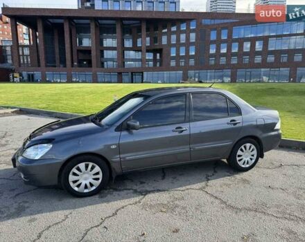Сірий Міцубісі Lancer, об'ємом двигуна 1.58 л та пробігом 276 тис. км за 3650 $, фото 3 на Automoto.ua