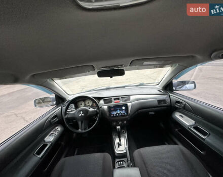 Серый Мицубиси Лансер, объемом двигателя 1.58 л и пробегом 183 тыс. км за 4800 $, фото 22 на Automoto.ua