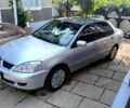 Сірий Міцубісі Lancer, об'ємом двигуна 1.6 л та пробігом 188 тис. км за 4000 $, фото 1 на Automoto.ua