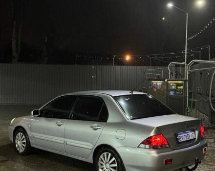 Серый Мицубиси Лансер, объемом двигателя 1.6 л и пробегом 330 тыс. км за 3200 $, фото 3 на Automoto.ua