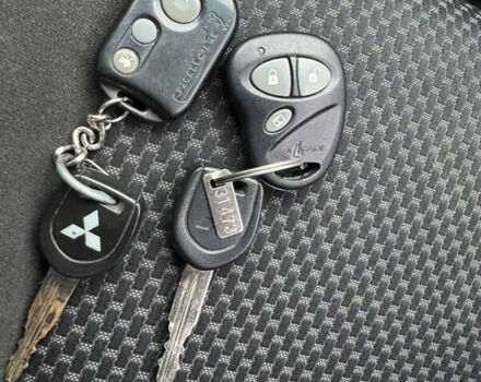 Серый Мицубиси Лансер, объемом двигателя 1.6 л и пробегом 242 тыс. км за 4300 $, фото 20 на Automoto.ua