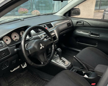 Серый Мицубиси Лансер, объемом двигателя 1.6 л и пробегом 310 тыс. км за 3500 $, фото 7 на Automoto.ua