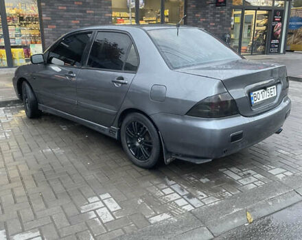Сірий Міцубісі Lancer, об'ємом двигуна 1.6 л та пробігом 244 тис. км за 2999 $, фото 5 на Automoto.ua