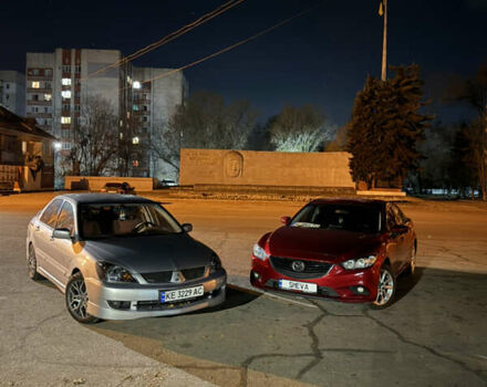 Серый Мицубиси Лансер, объемом двигателя 2 л и пробегом 256 тыс. км за 7000 $, фото 11 на Automoto.ua