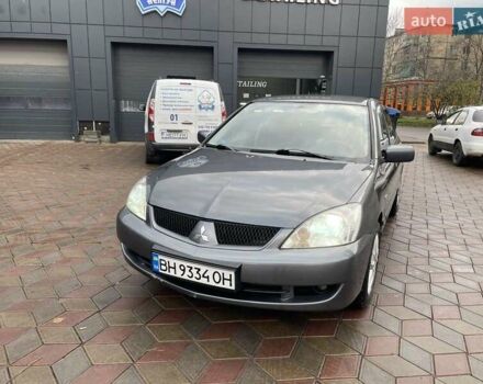 Сірий Міцубісі Lancer, об'ємом двигуна 1.6 л та пробігом 262 тис. км за 4400 $, фото 4 на Automoto.ua