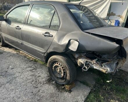 Сірий Міцубісі Lancer, об'ємом двигуна 1.6 л та пробігом 200 тис. км за 1150 $, фото 4 на Automoto.ua