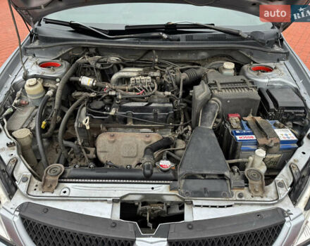 Серый Мицубиси Лансер, объемом двигателя 1.6 л и пробегом 242 тыс. км за 4300 $, фото 14 на Automoto.ua