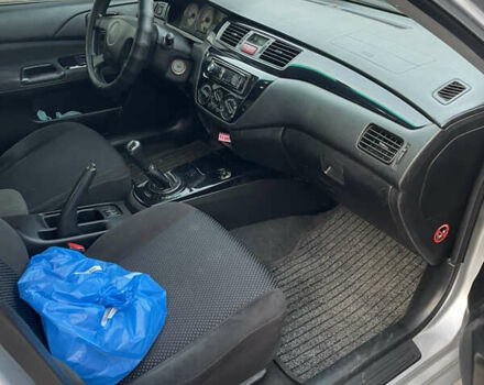 Сірий Міцубісі Lancer, об'ємом двигуна 1.58 л та пробігом 430 тис. км за 2550 $, фото 10 на Automoto.ua