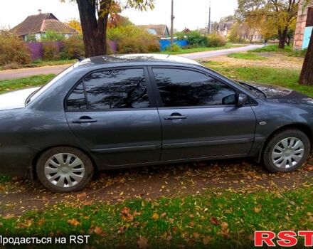 Серый Мицубиси Лансер, объемом двигателя 1.6 л и пробегом 214 тыс. км за 4500 $, фото 9 на Automoto.ua