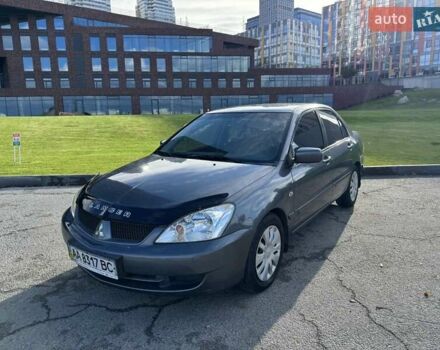 Сірий Міцубісі Lancer, об'ємом двигуна 1.58 л та пробігом 276 тис. км за 3650 $, фото 2 на Automoto.ua