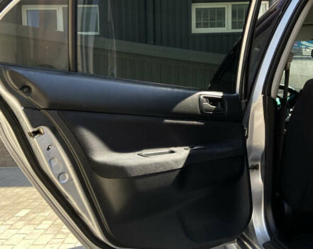 Сірий Міцубісі Lancer, об'ємом двигуна 1.6 л та пробігом 200 тис. км за 4400 $, фото 13 на Automoto.ua