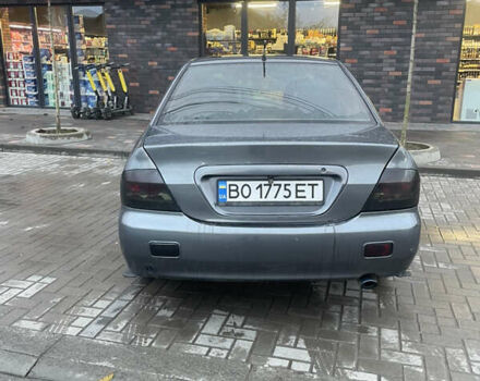 Сірий Міцубісі Lancer, об'ємом двигуна 1.6 л та пробігом 244 тис. км за 2999 $, фото 6 на Automoto.ua
