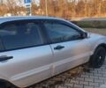 Серый Мицубиси Лансер, объемом двигателя 1.58 л и пробегом 301 тыс. км за 3500 $, фото 7 на Automoto.ua